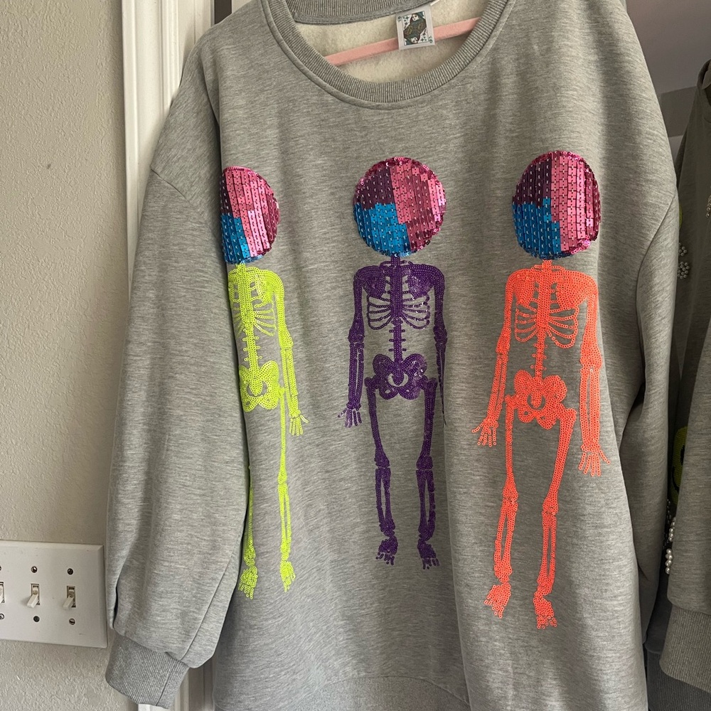 Gray Sweatshirt with Colorful Skeleton Design